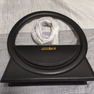Jacquemus Black Circle purse.